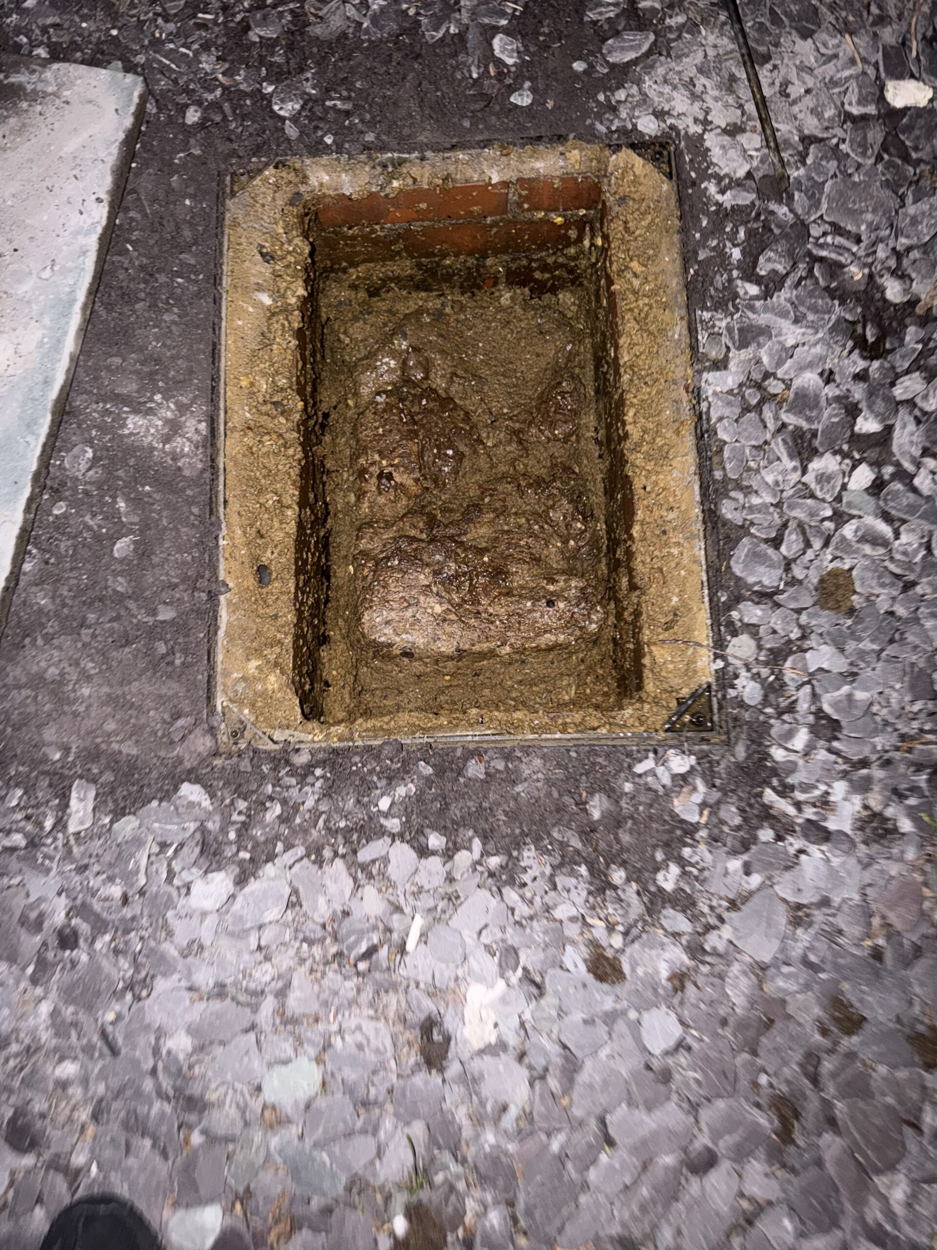 Blocked manhole with silt — CCTV drainage survey